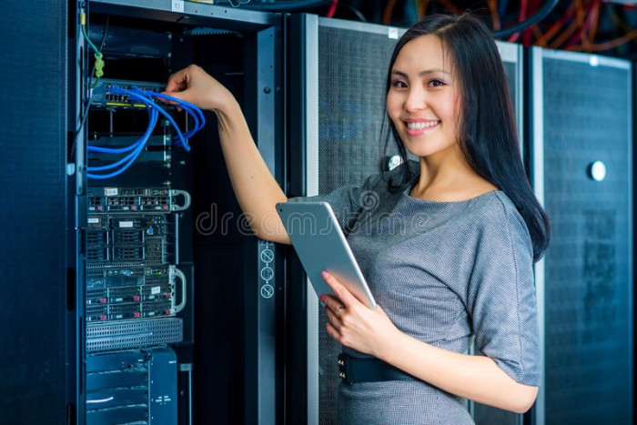 engineer-businesswoman-network-server-room-young-tablet-64103074
